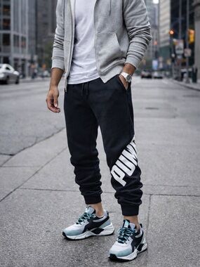 PUMA BLACK JOGGER SWEATPANTS MENS SIZE L LARGE TAPERED WHITE ATHLETIC PUMA LOGO